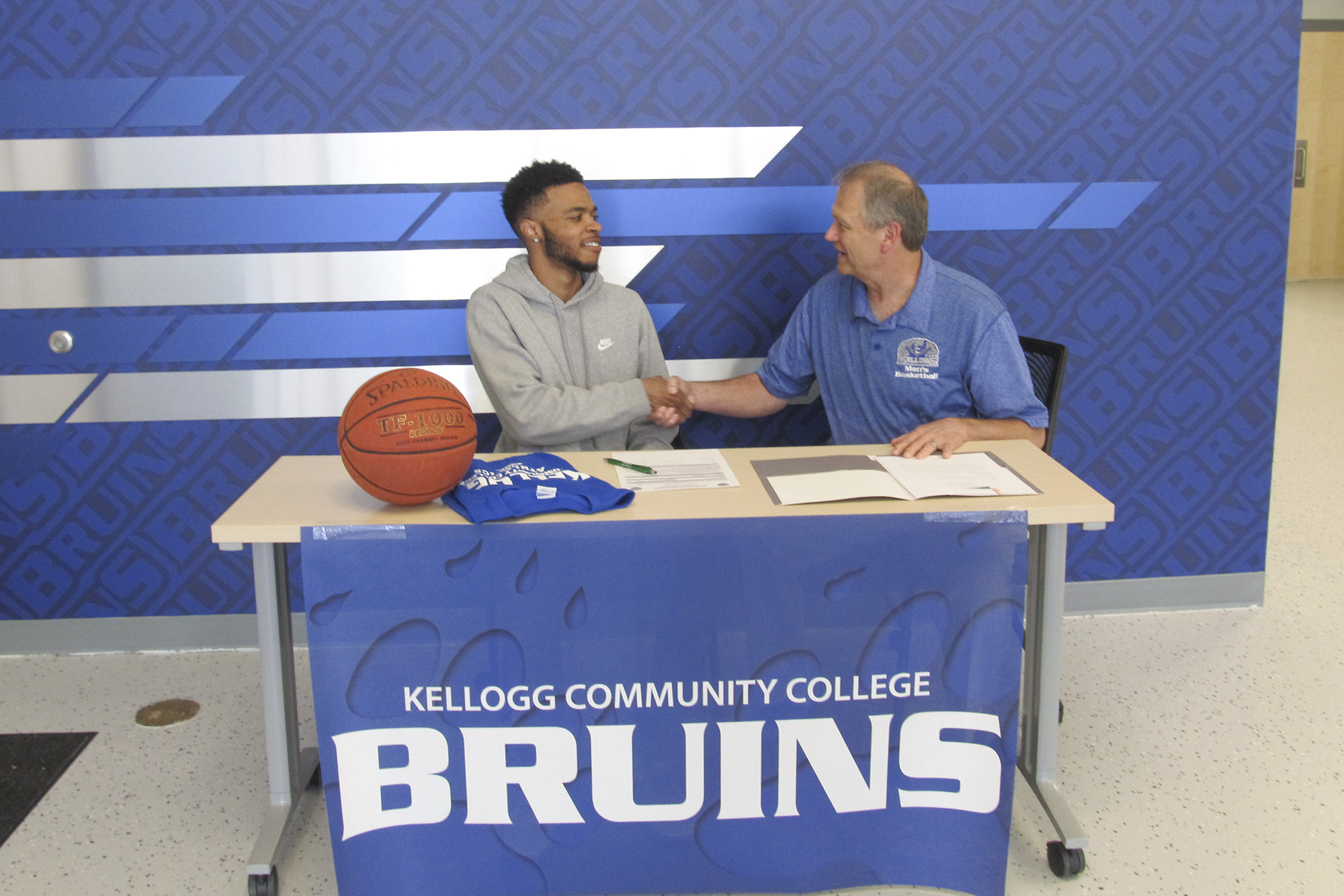 Pictured, from left to right, are Jamari Newell and KCC’s Head Men’s Basketball Coach Gary Sprague.