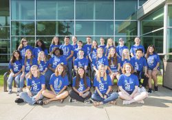 A group photo of KCC's 2019-20 honor students posing outside the Binda Performing Arts Center.