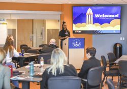 KCC President Adrien Bennings leads an employee input session in the Kellogg Room.