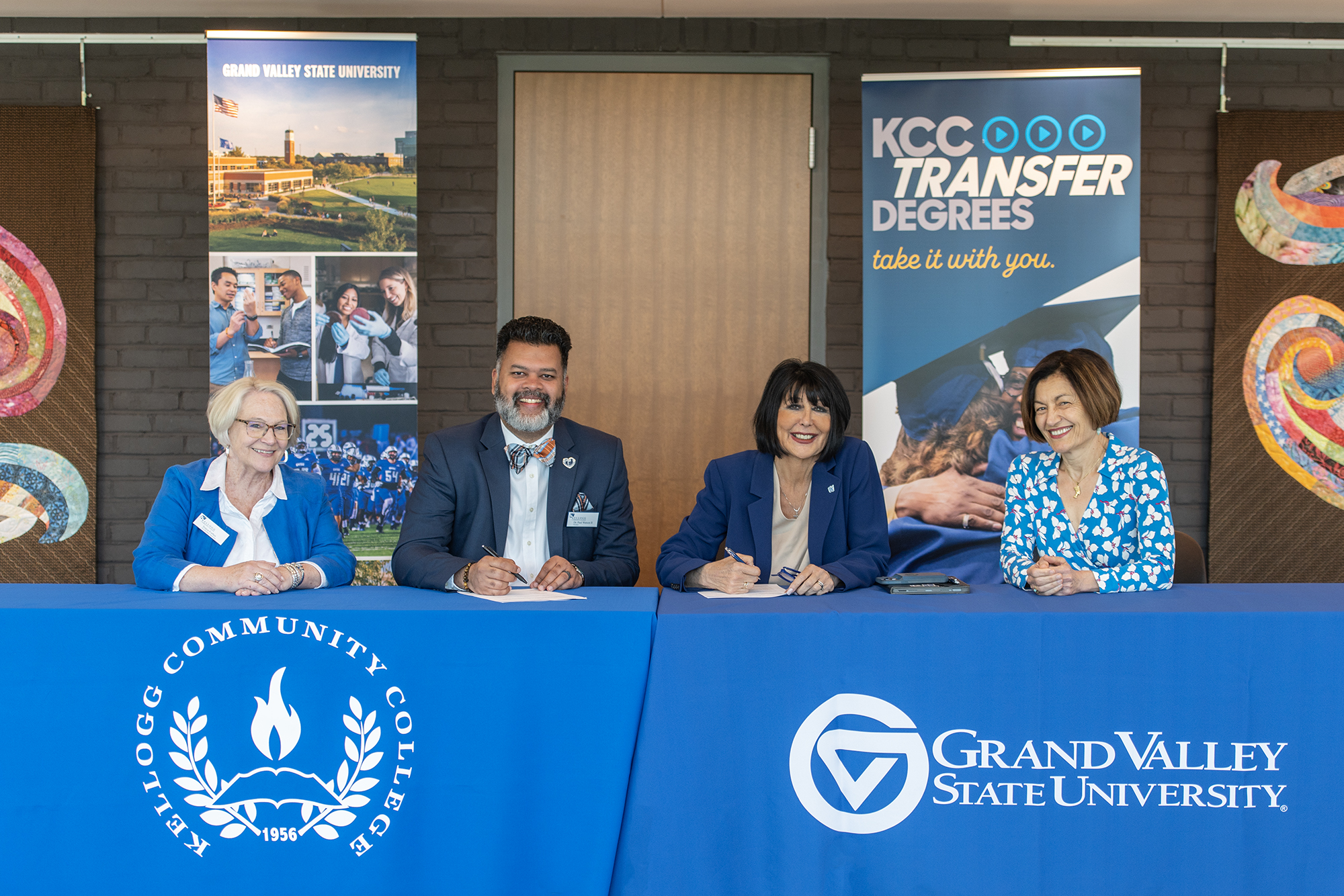 Pictured, from left to right, are KCC Vice President for Instruction Tonya Forbes, KCC President Dr. Paul R. Watson II, GVSU President Philomena V. Mantella and GVSU Provost Fatma Mili.