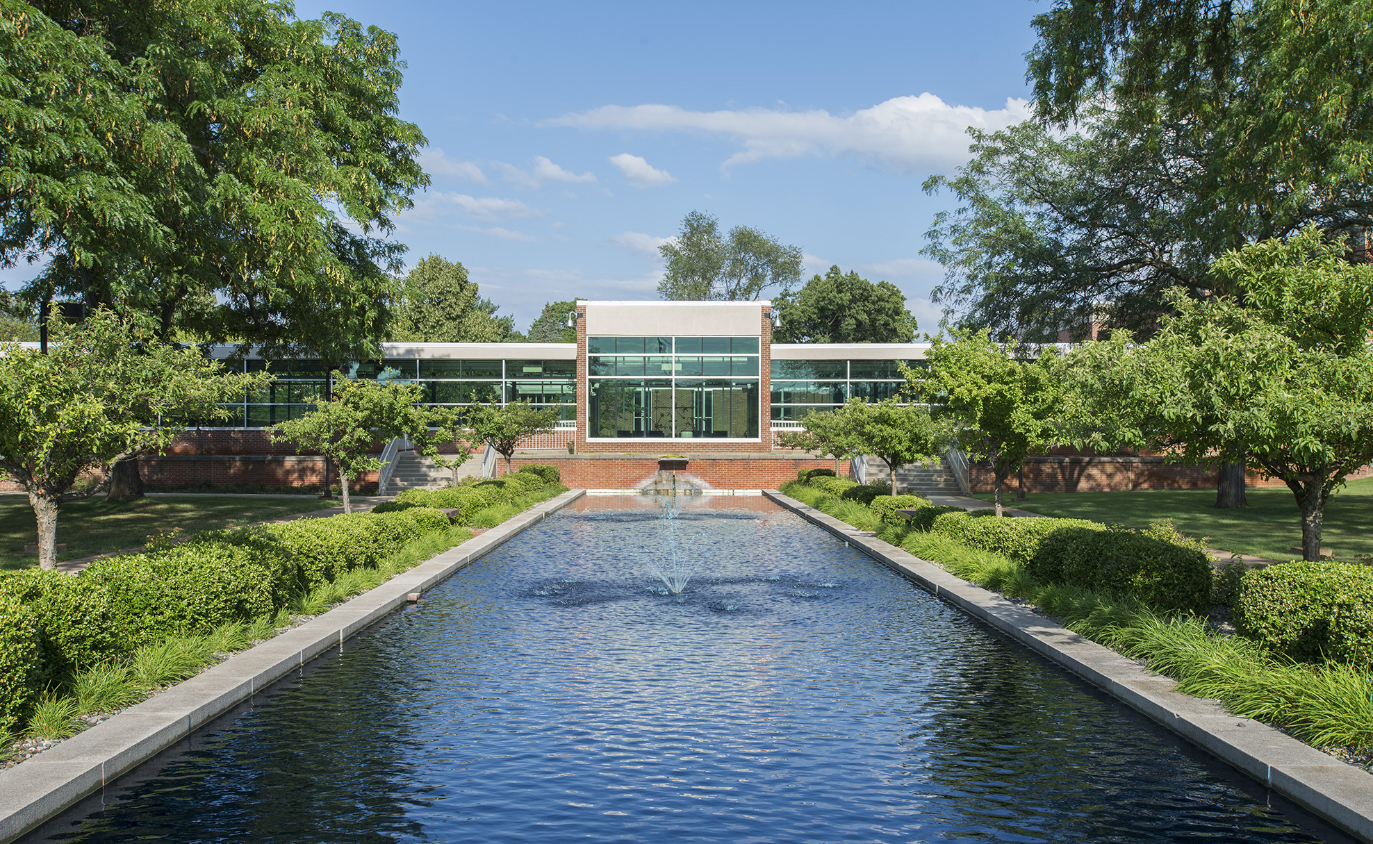 An exterior view of the entrance to KCC's North Avenue campus looking over the reflecting pools.