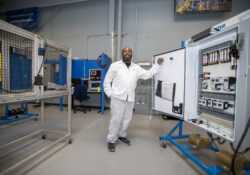 Martin Gray poses in the Electricity and Electronics Lab at the RMTC.