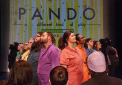 "Pando" actors post in front of a graphic that reads, "PANDO."