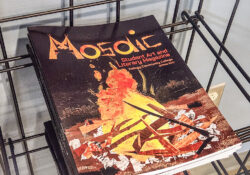 A stack of issues of KCC's Mosaic art and literary journal.