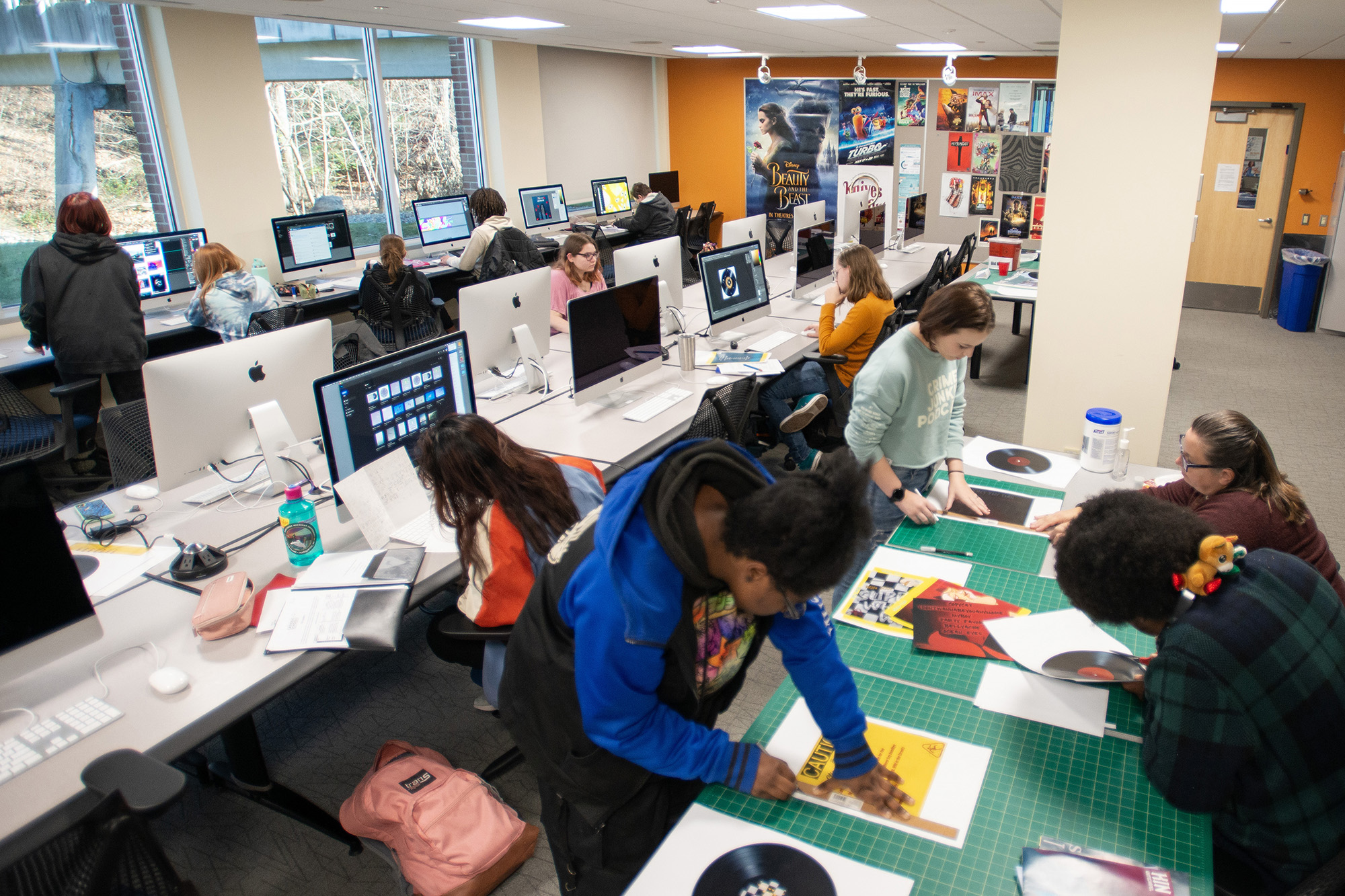 Graphic Design students work on projects during class in the Graphic Design Lab.