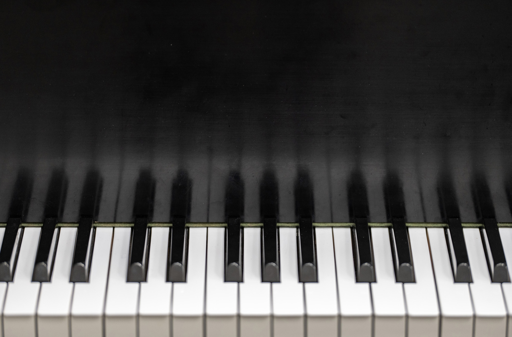 An overhead view of a piano keyboard.