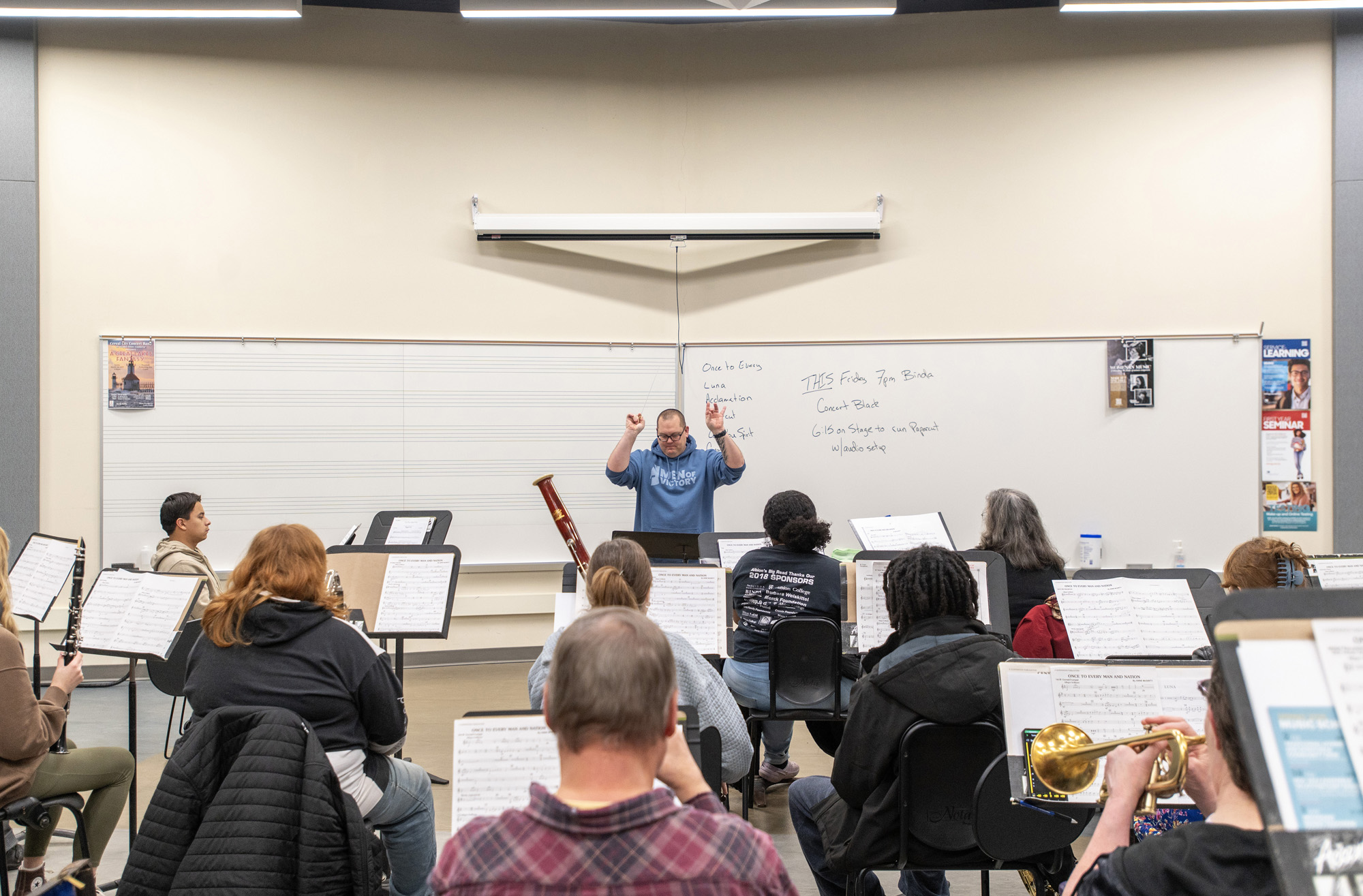 The Concert Band rehearses in a band room on campus.
