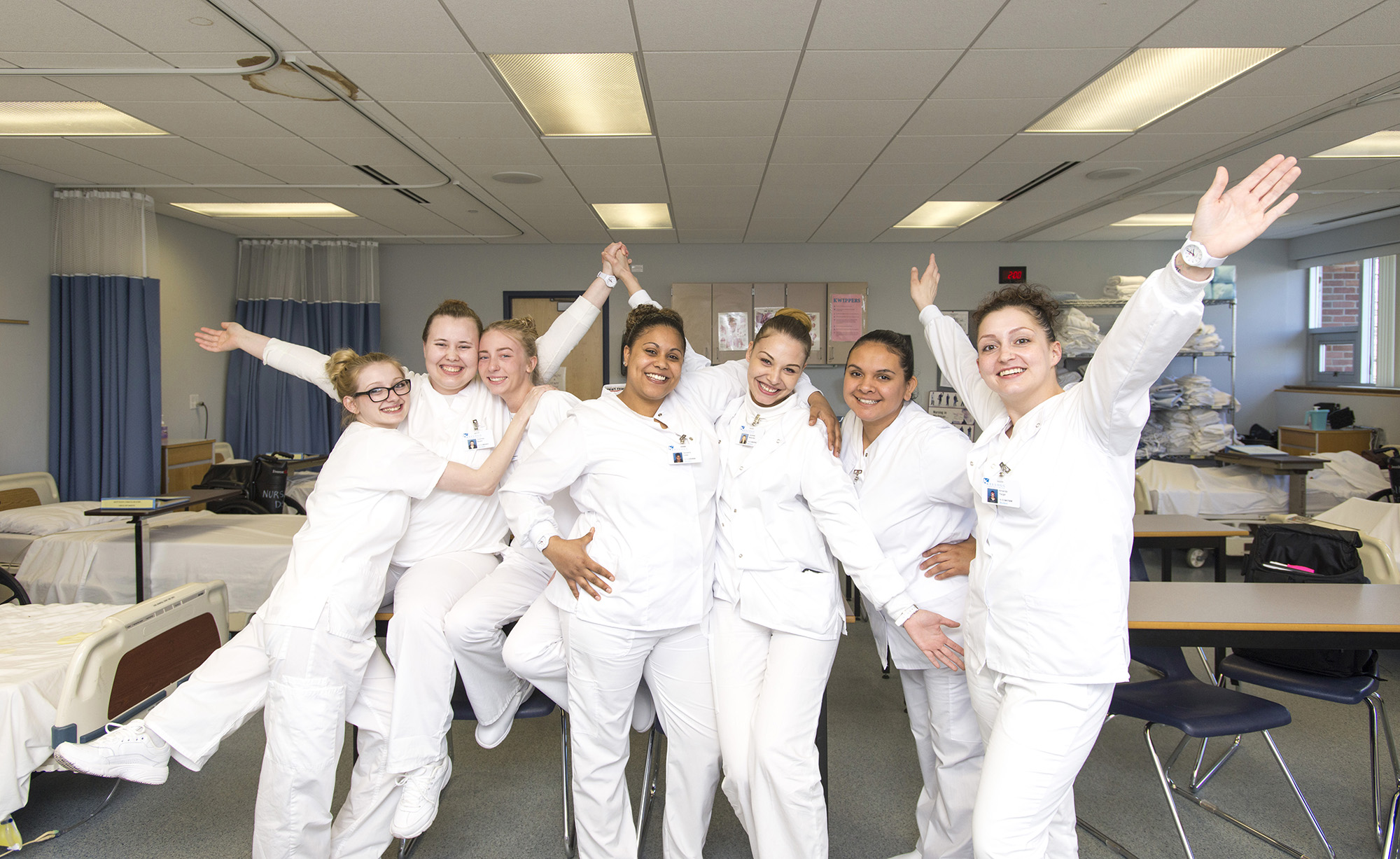 CNA students pose for a group photo in a CNA Lab on campus.