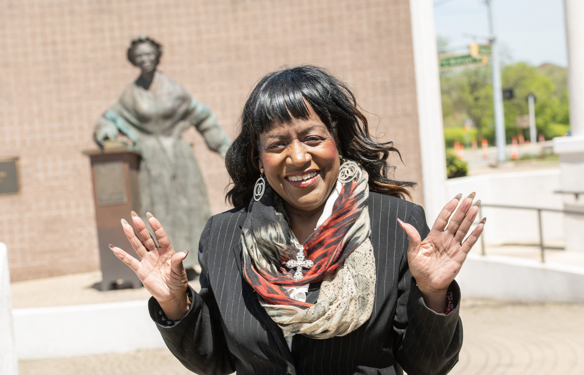Donna Turner Rickman poses in front of a Sojourner Truth statue.