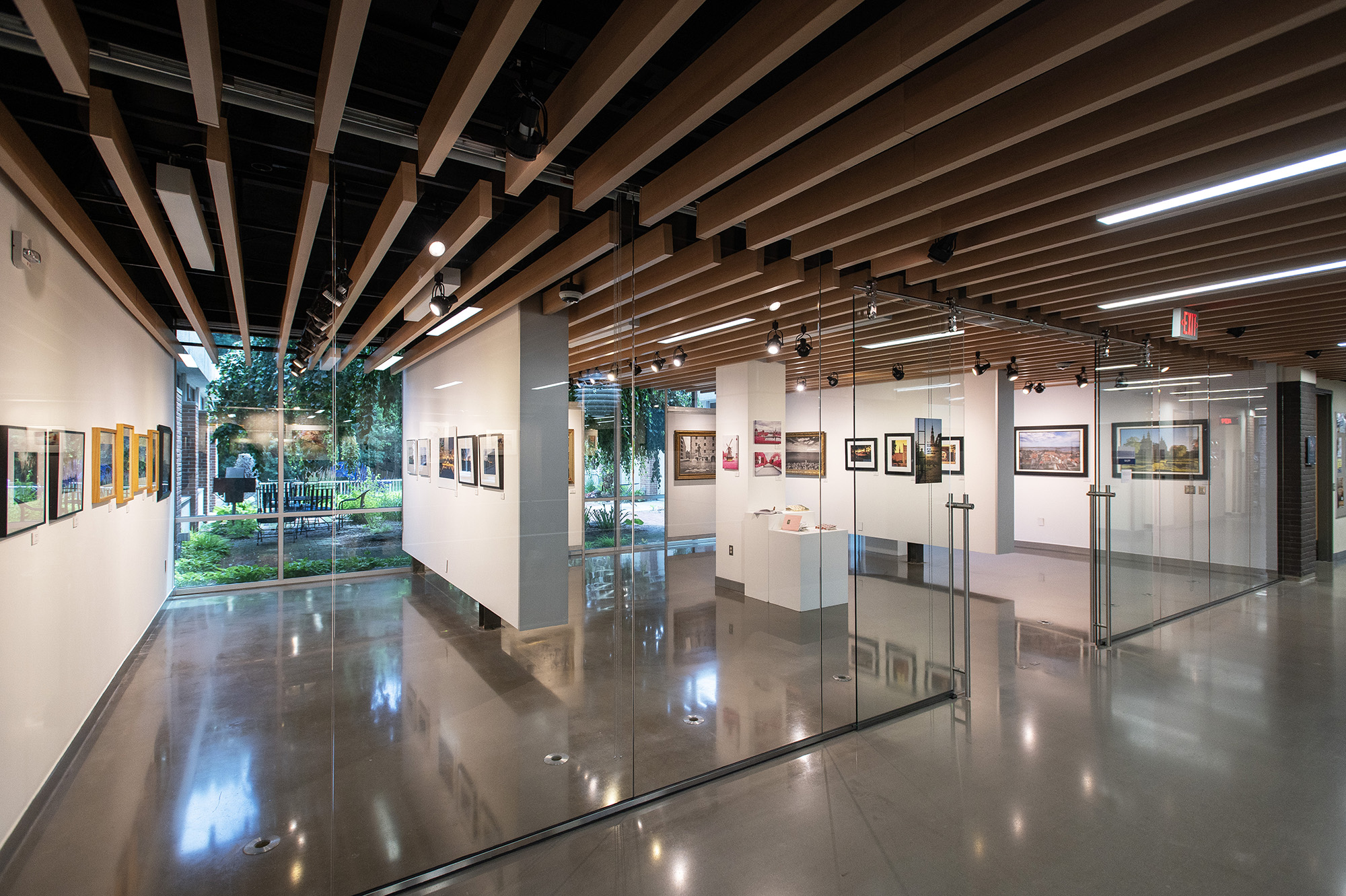 A landscape photography exhibit on display in the college gallery.