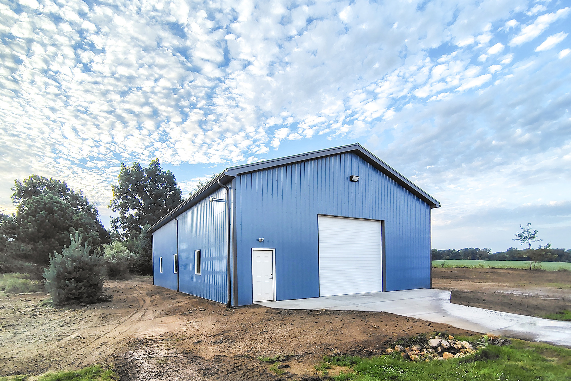 A large blue auxiliary building.
