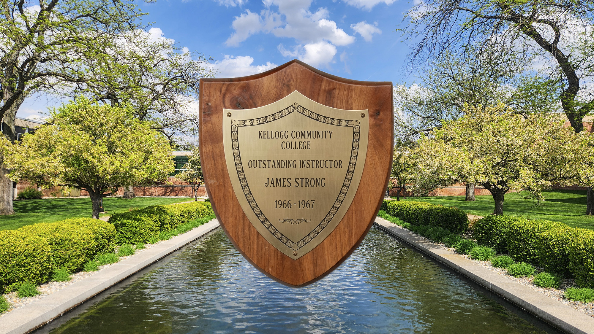 A plaque with text on it that reads, “Kellogg Community College Outstanding Instructor James Strong, 1966-1967,” superimposed over a photo of campus.