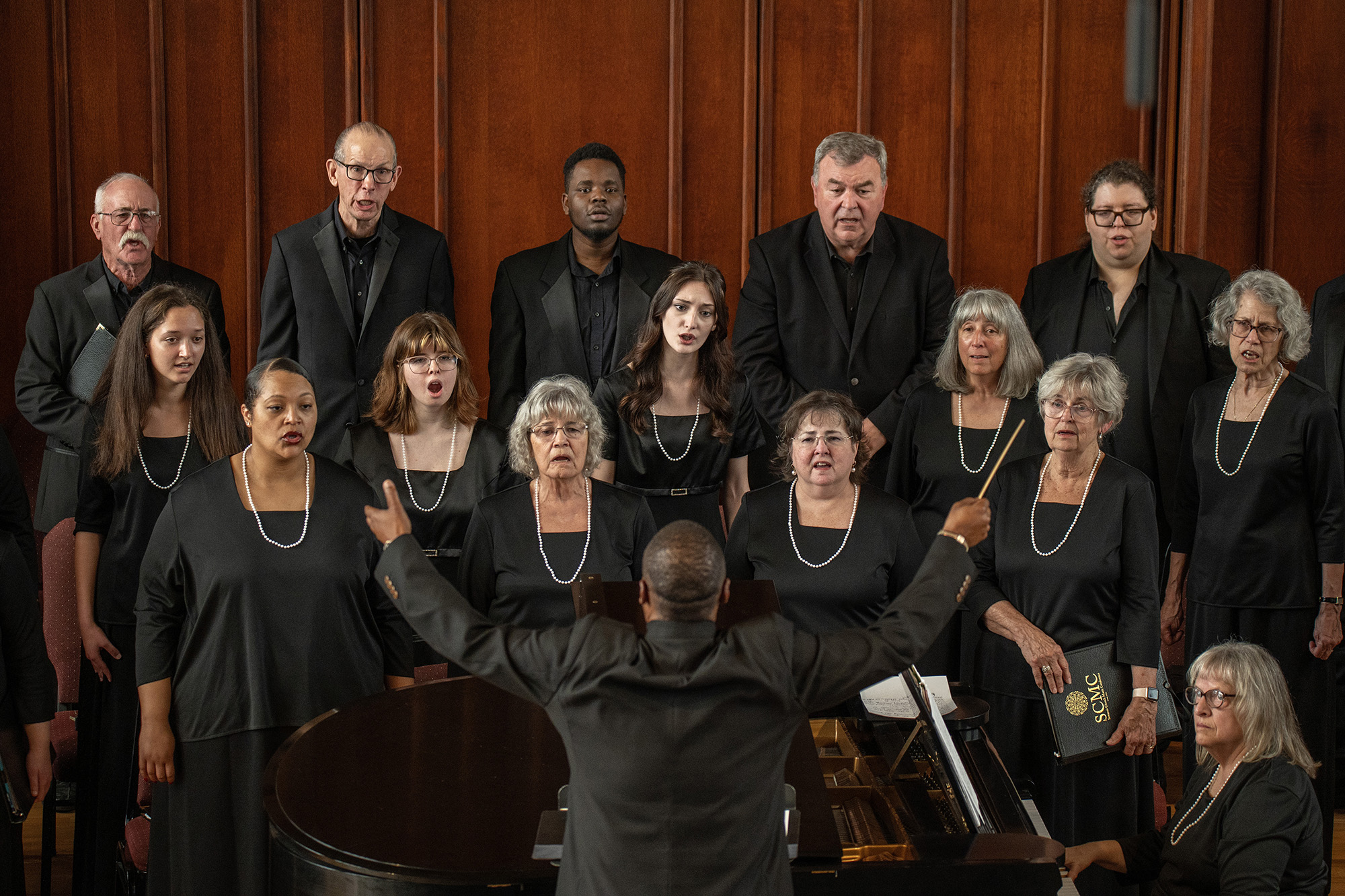 The choir sings during a concert.